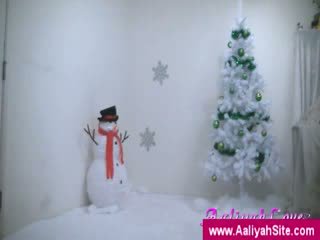 Aaliyah next to the Xmas tree
