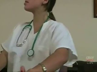 Cute brunette doctor gives her patient a handjob for cum tasting
