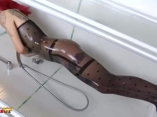 Redhead Onix Babe in nylon catsuit masturbates in the shower Porn Videos